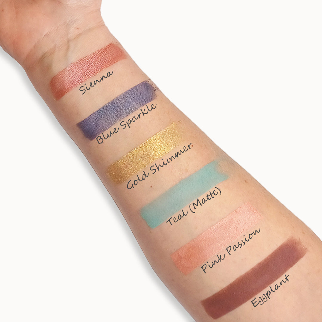 Color swatches on a person's arm with labeled shades.