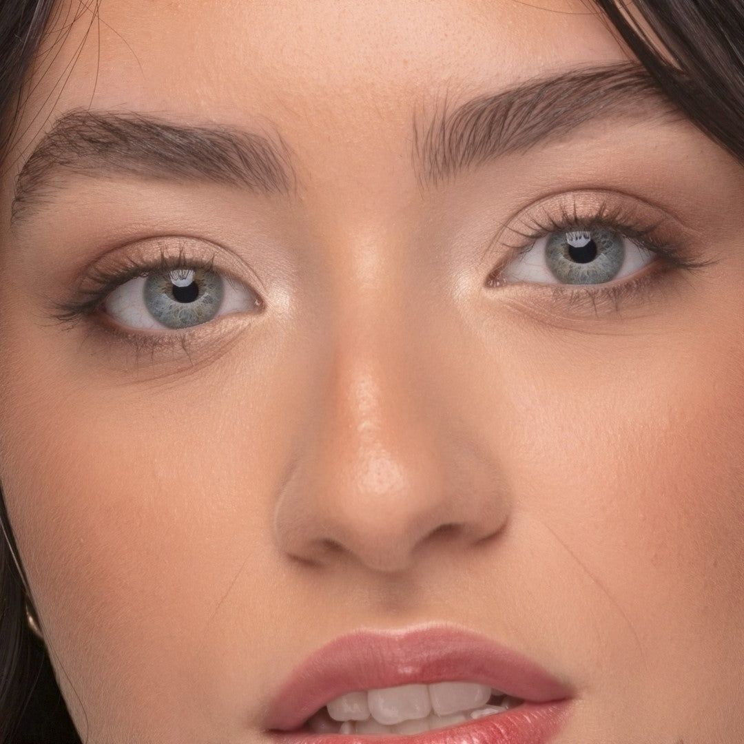Closeup of a woman's eyes wearing Demure Brown Mascara