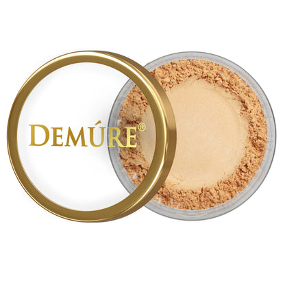 Open container of Demure Apricot eye color with gold lid on a white background