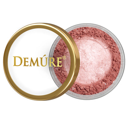 Open container of Demure Hot Pink eye color with gold lid on a white background