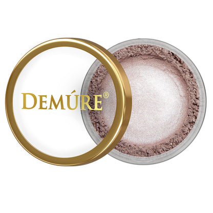Open container of Demure Limited Edition Lilac Frost  eye color with gold lid on a white background
