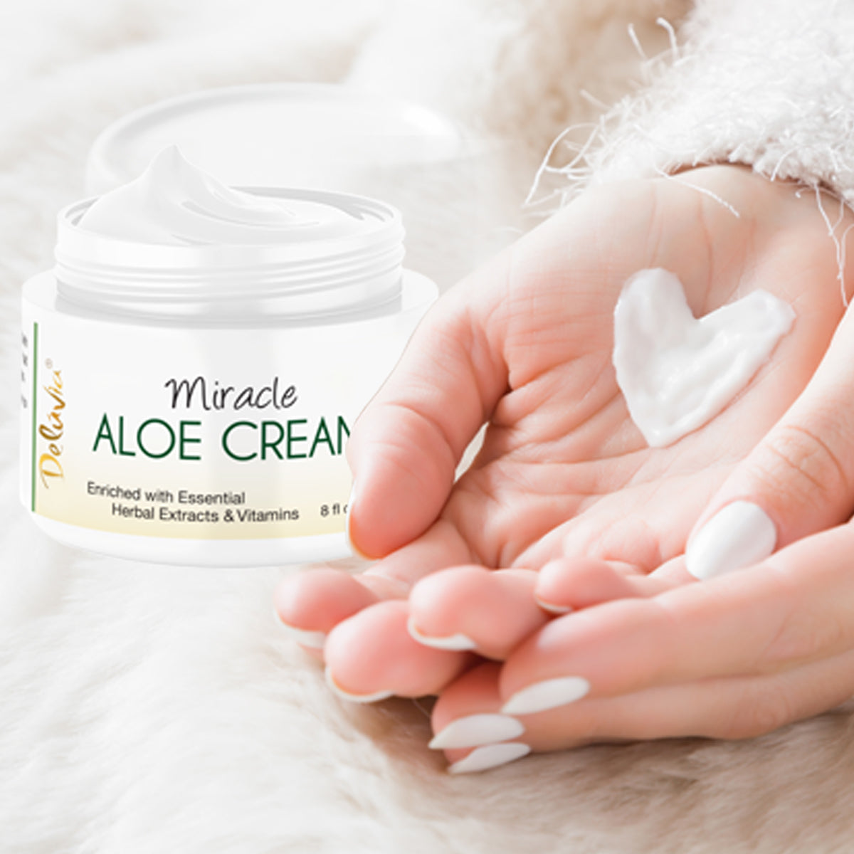 A jar of Deluvia Miracle Aloe Cream with a woman's hand with a smear of cream in the shape of a heart