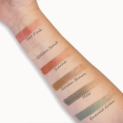 Color swatches on a person's arm with labels for different shades.