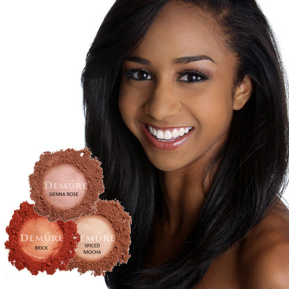 A photo of an African American woman wearing blush along with three swatches of blush color options