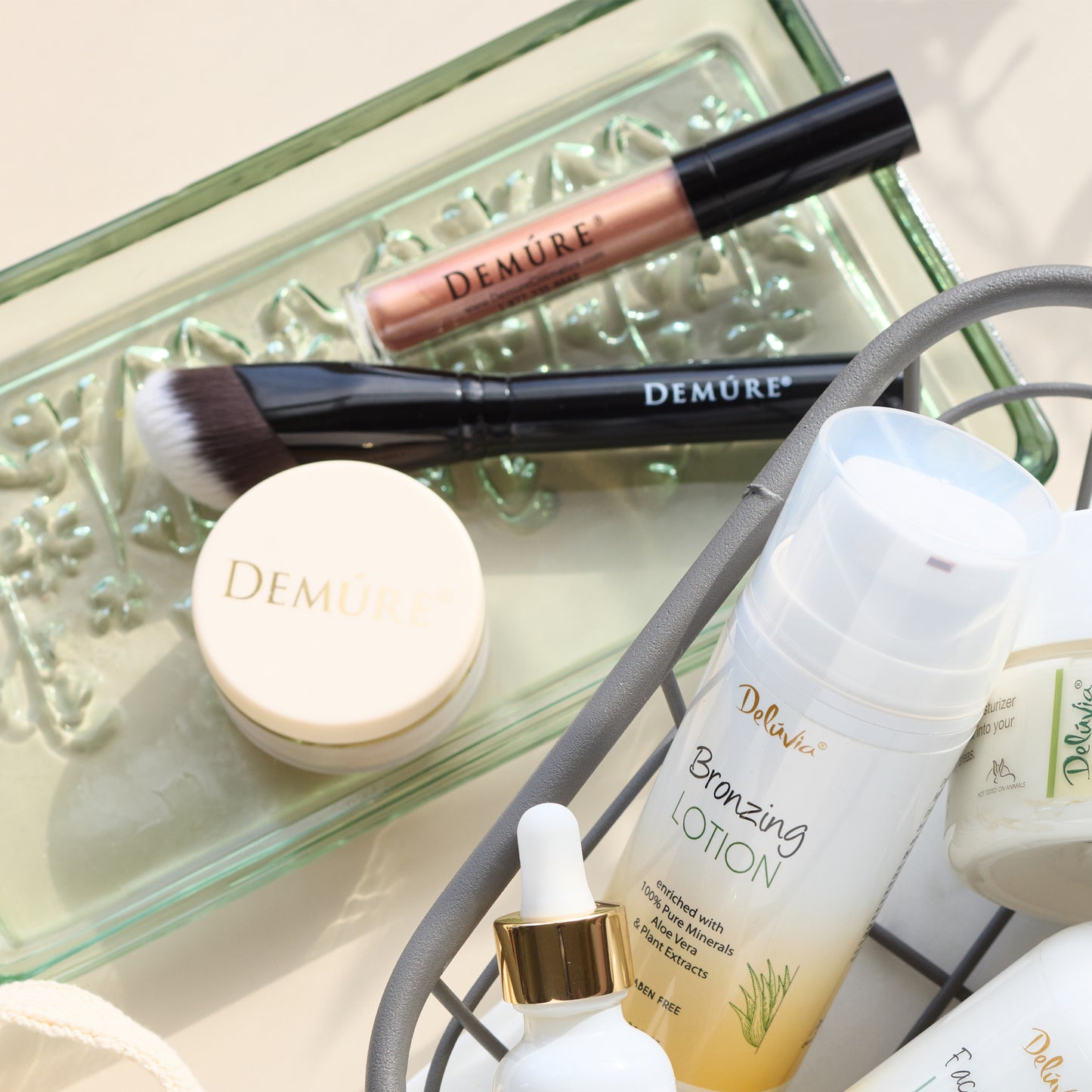 Demure Sculpting Contour Brush in a glass makeup dish