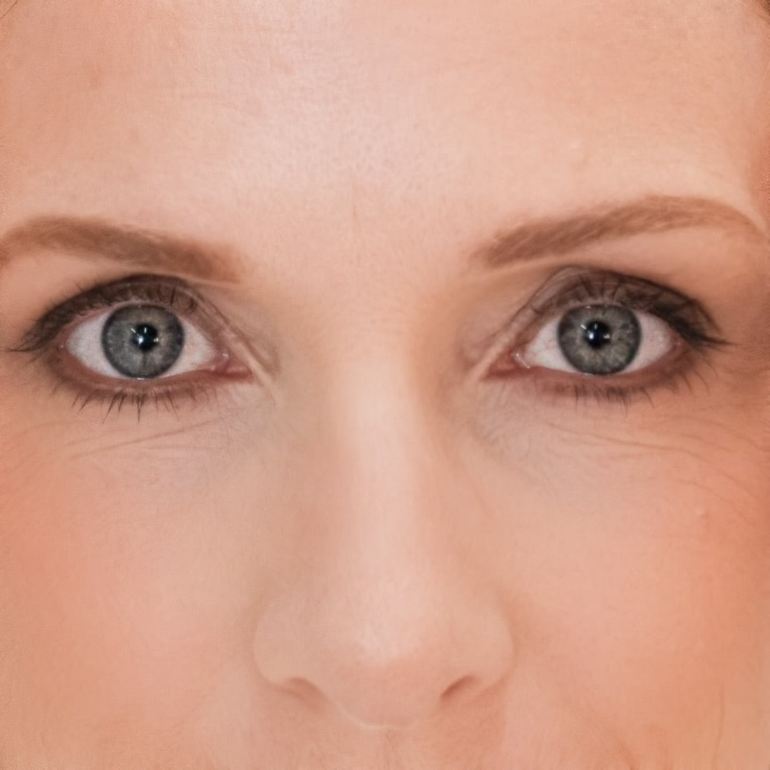 Close up of woman's eyes wearing Demure Earth 47 Eye Liner 