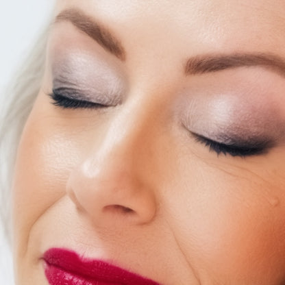 Close-up of a woman's face with Eye Colors Snowflake, Midnight Blue and Black Liner