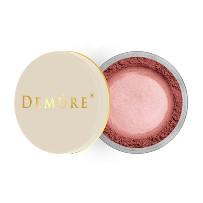 Open container of Demure Bold Berry color loose blush with a gold lid