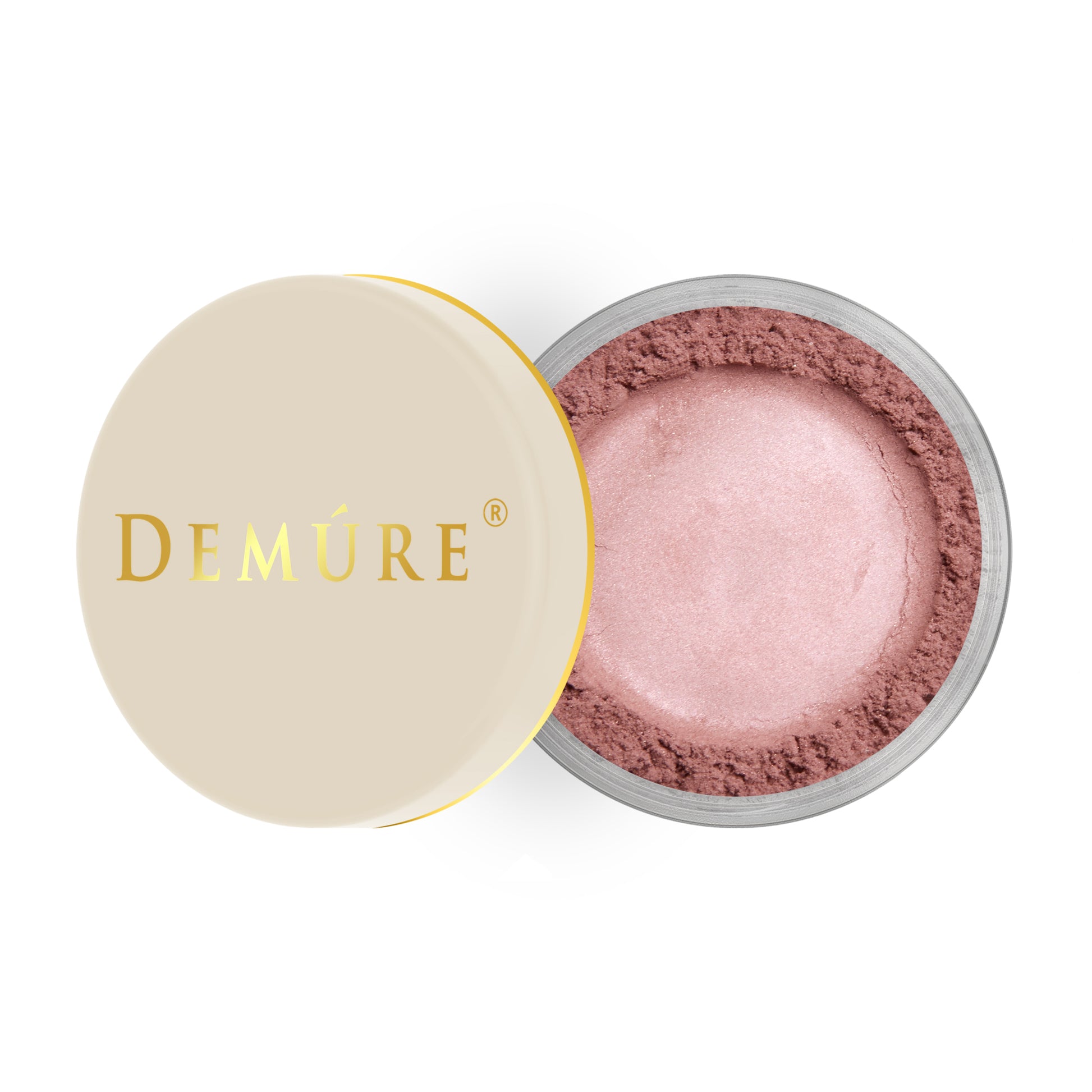 Open container of Demure Mauve color loose blush with a gold lid