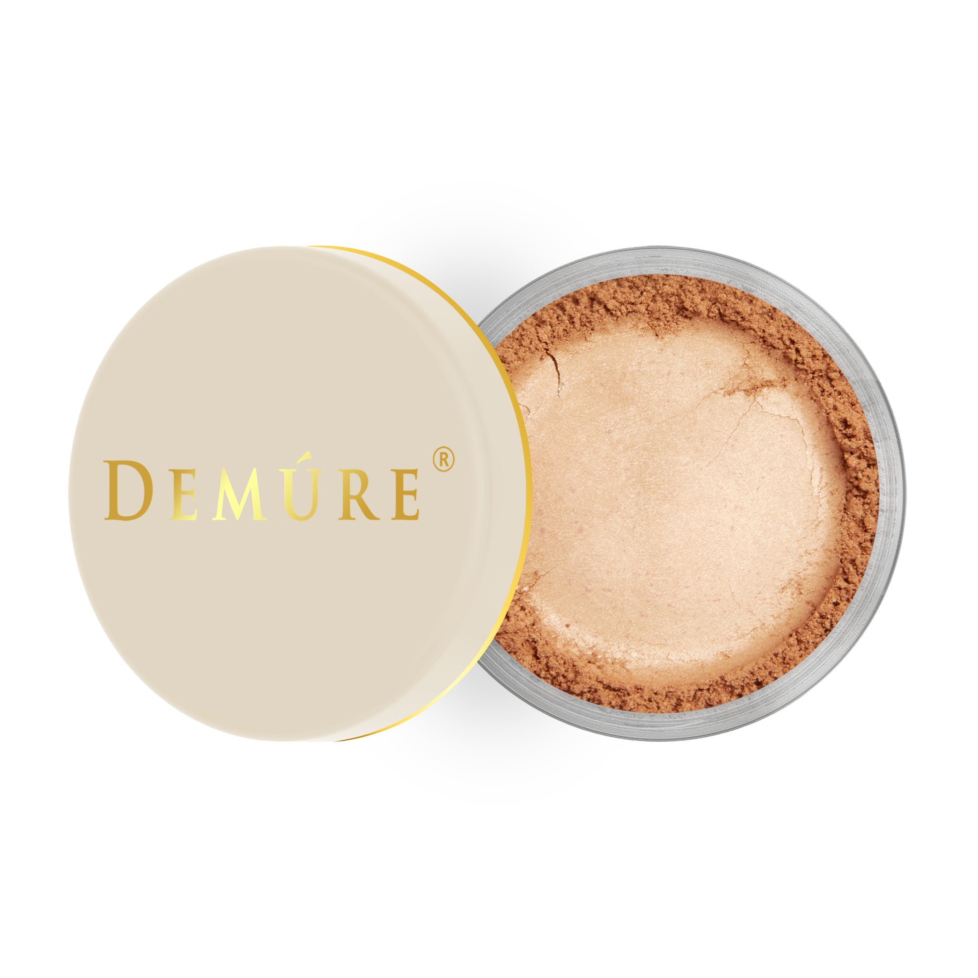 Open container of Demure Peachy color loose blush with a gold lid
