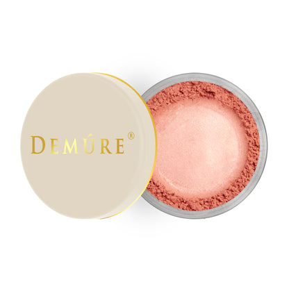 Open container of Demure Strawberry color loose blush with a gold lid