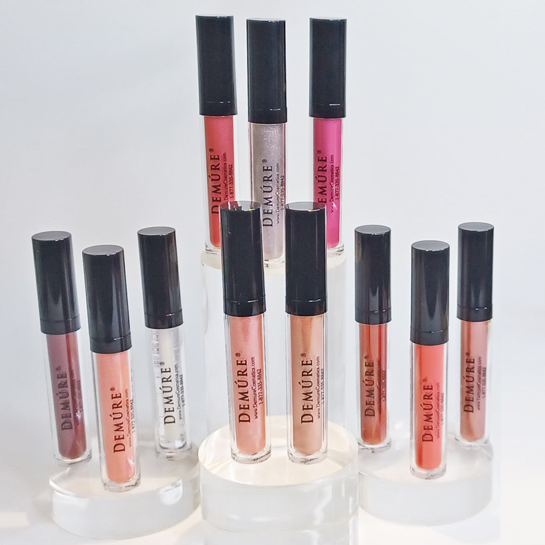 Set of Demure lip glosses on a white background