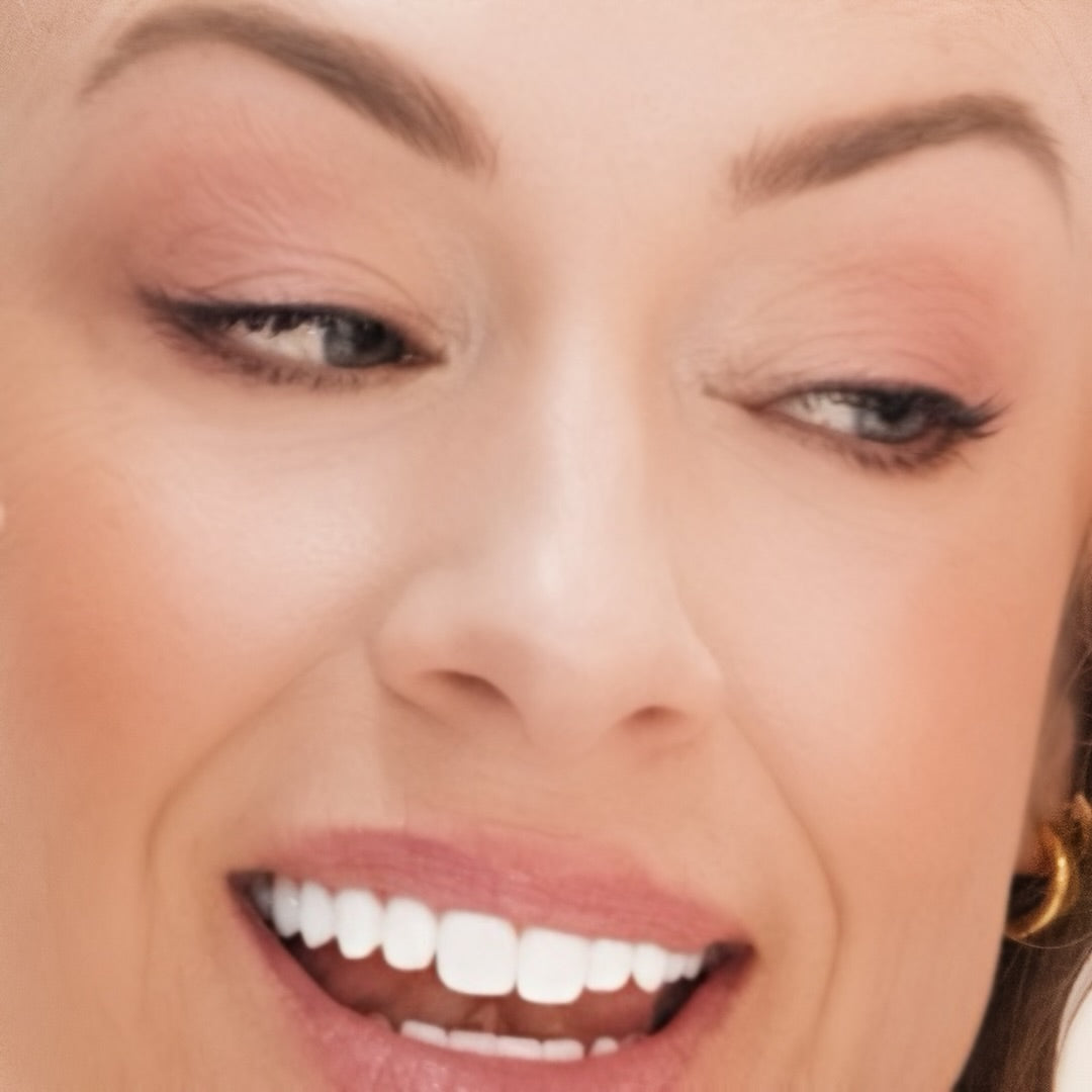 Close up of woman's eyes wearing Demure Eye Colors Hot Pink, Gold Sparkle, and Dusty Rose