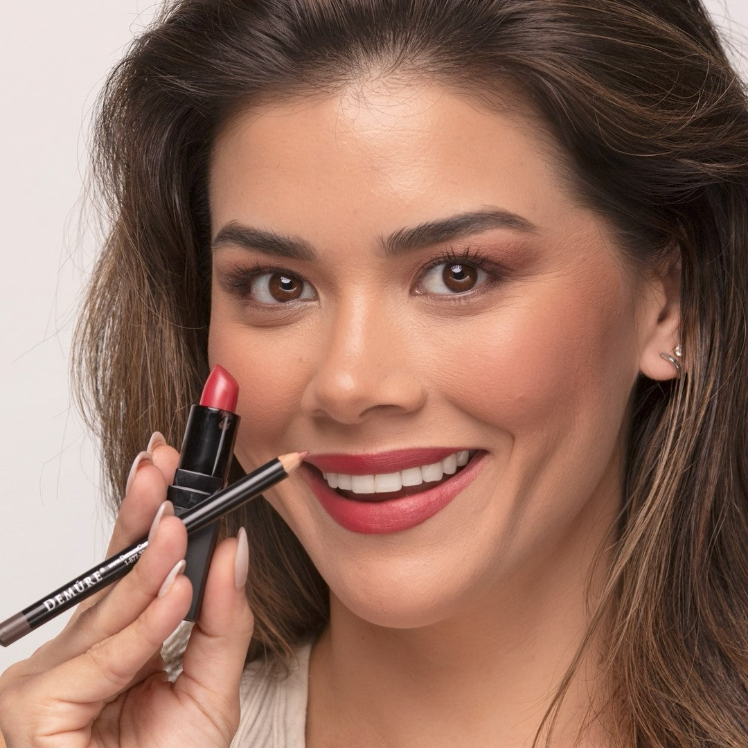 Woman wearing Sweetheart Lipstick and Sable Brown Lip Liner, smiling.