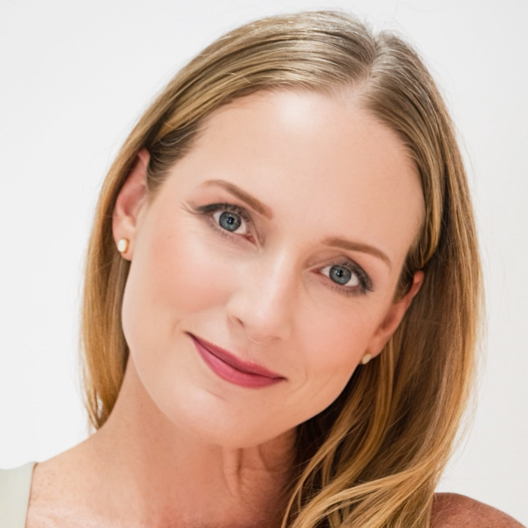 Woman wearing Demure Original Concealer under her eyes