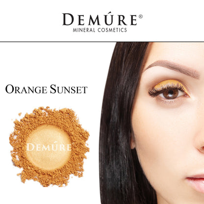 Woman's face close up with Orange Sunset eye color on her eye lid