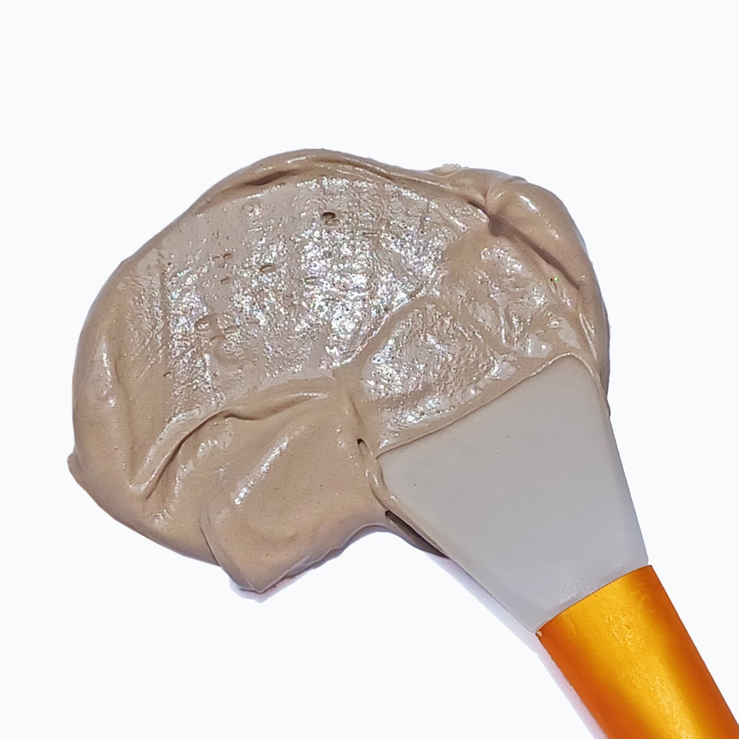 Swatch of Deluvia Hydrating Dead Sea Mud Mask with Aloe and applicator