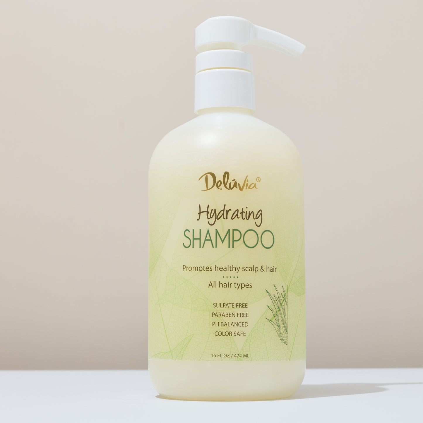 Deluvia Hydrating Shampoo bottle on a light background