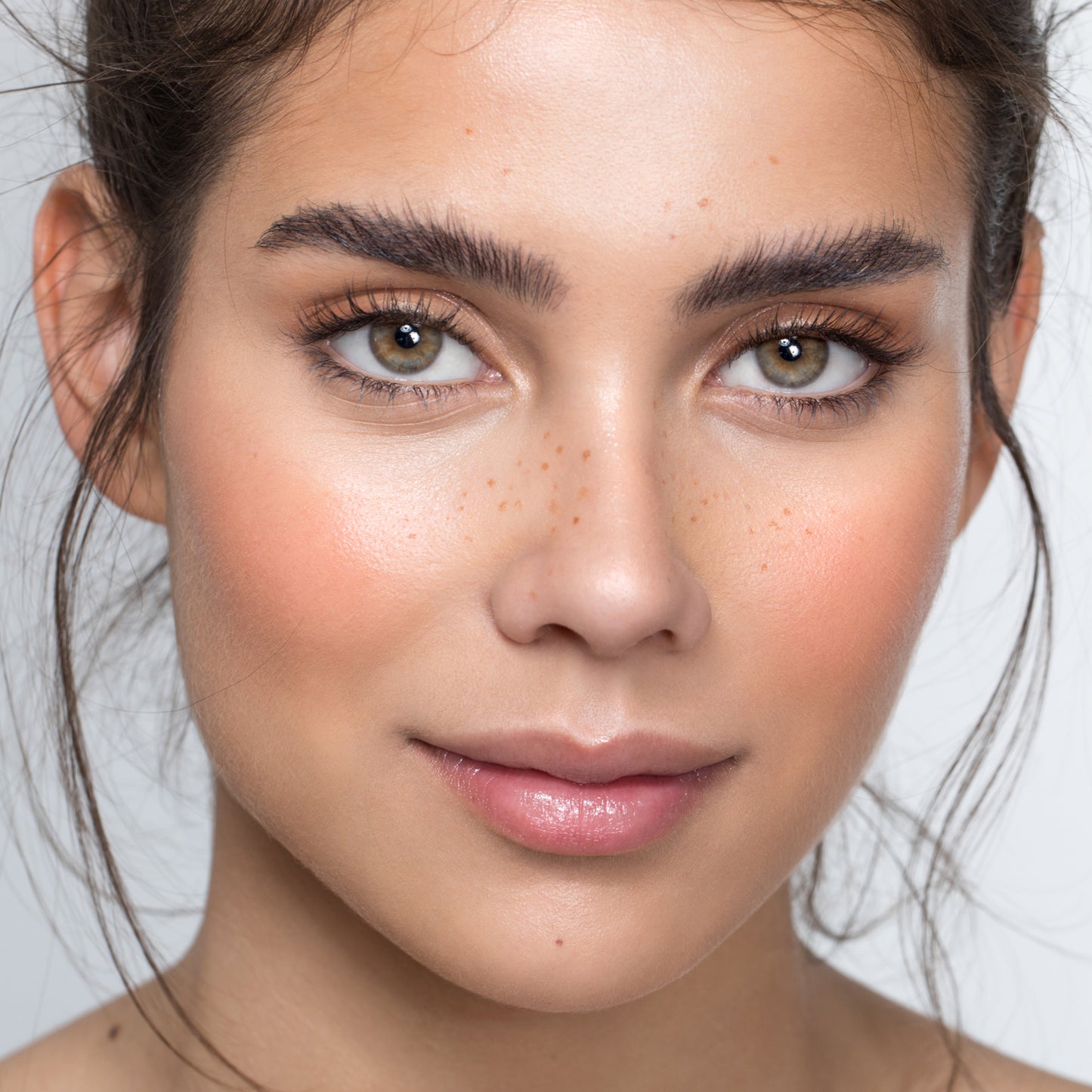 A photo of a woman wearing Demure Strawberry Blush