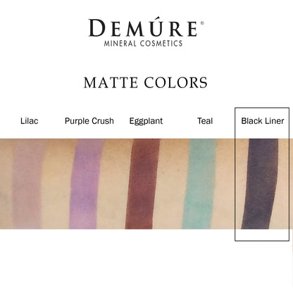 Woman's arm with a swatch of Black Liner eye color as well as four other complimentary colors