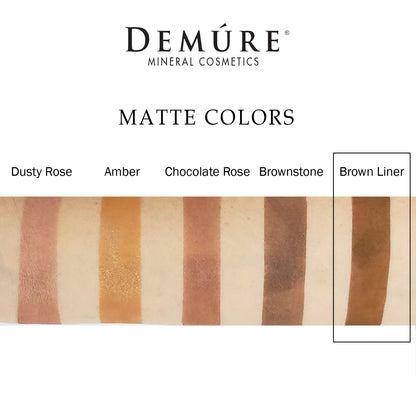 Woman's arm with a swatch of Brown Liner eye color as well as four other complimentary colors