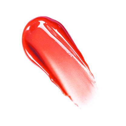 Swatch of Demure Lip Gloss Red Pop 86