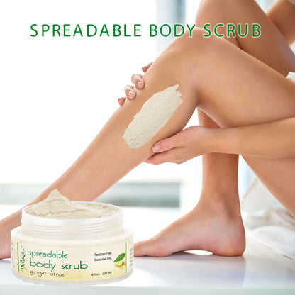 Woman applying Deluvia Ginger Citrus Spreadable Body Scrub to her lower leg