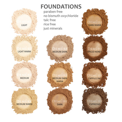 Mineral Photo of sample swatches of Demure loose mineral foundation shades, including light, light warm, medium, medium warm, medium dark, medium dark warm, dark, dark warm, spiced honey, cappuccino, and espresso.