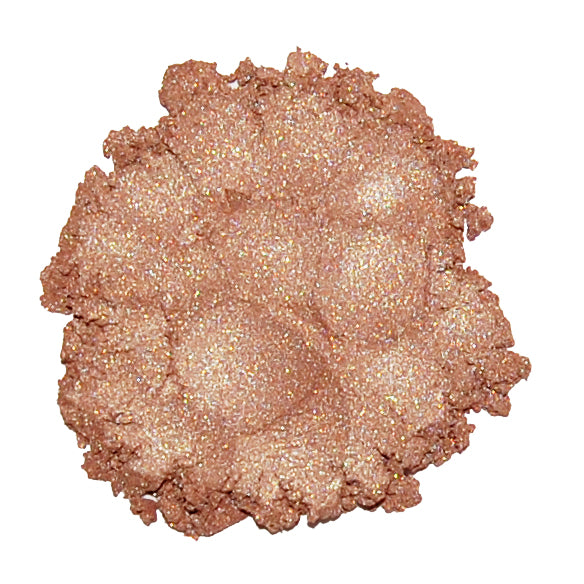 A swatch of Limited Edition #6 Light Copper mineral eye color, showing a shimmery golden copper tone.