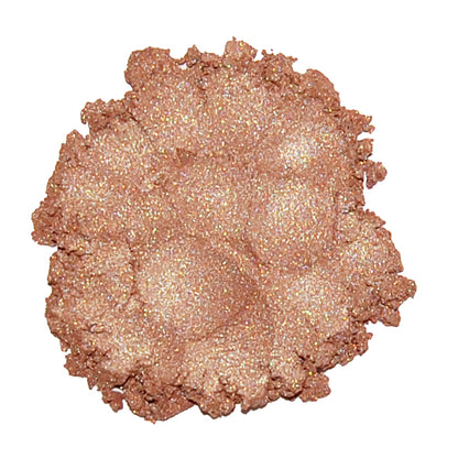 A swatch of Limited Edition #6 Light Copper mineral eye color, showing a shimmery golden copper tone.