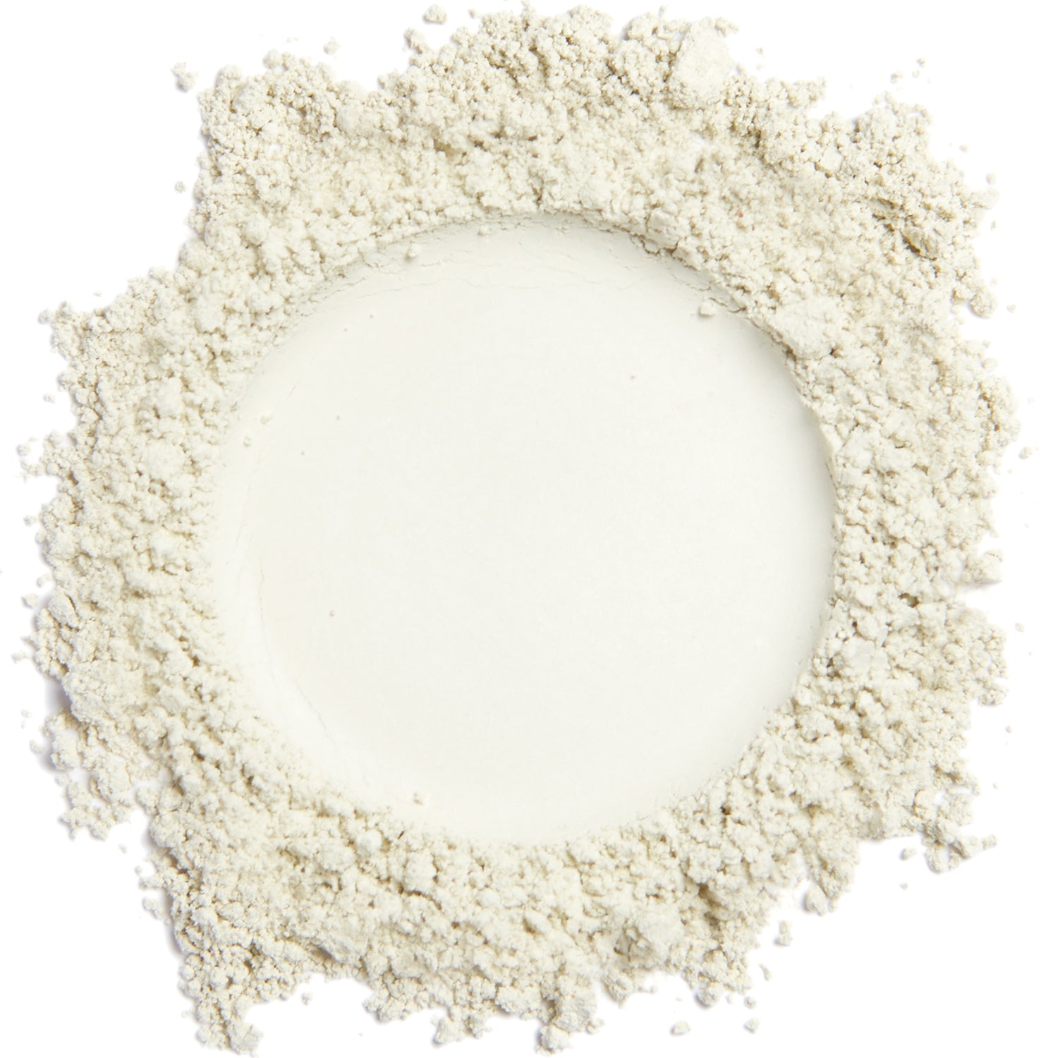 A close up swatch of Mint mineral concealer