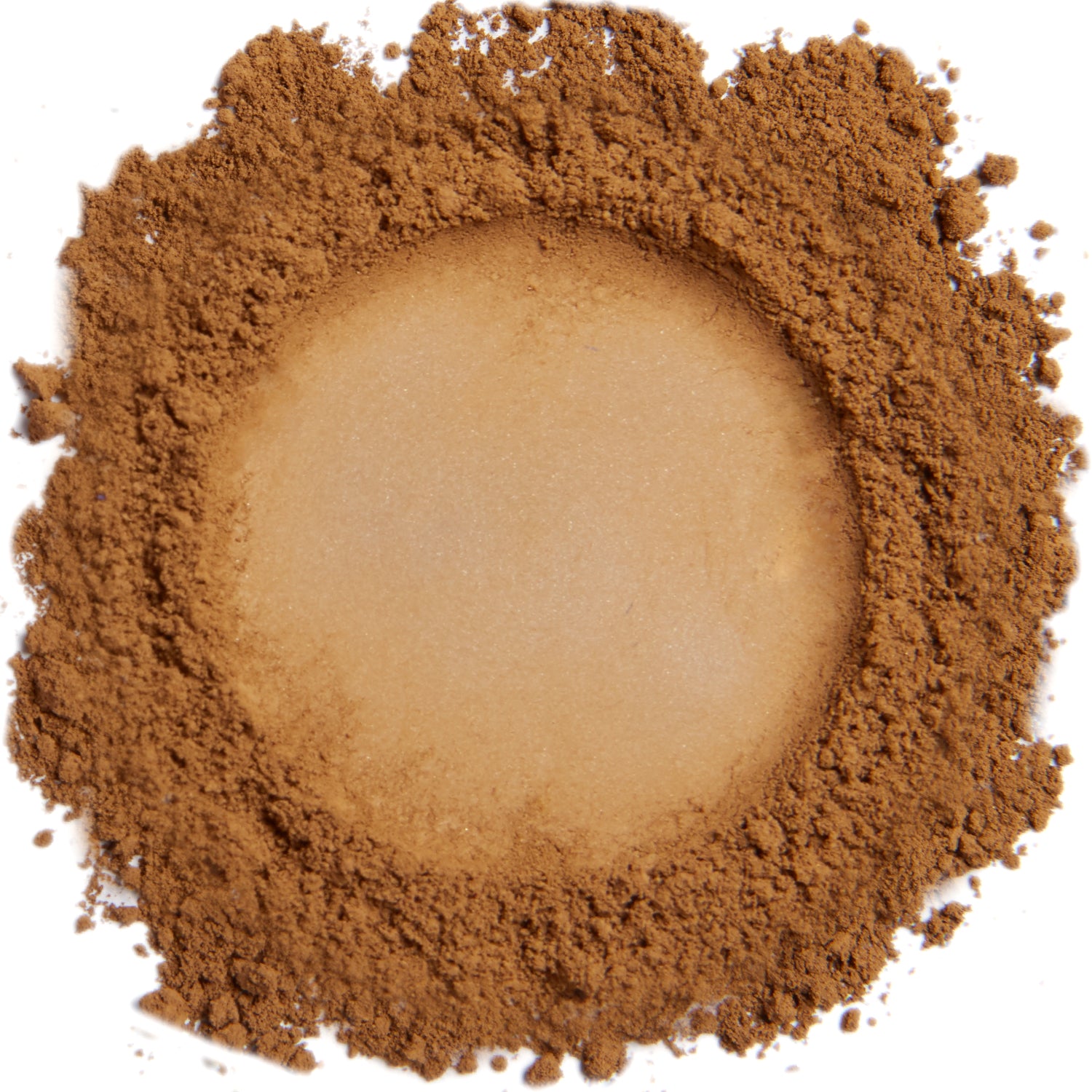 A close up swatch of Dark Warm mineral foundation
