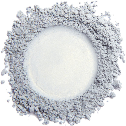 A sample of the Demure product called "Silver Blue Mineral Eye Color". The photo shows a pale silver blue matte color.  