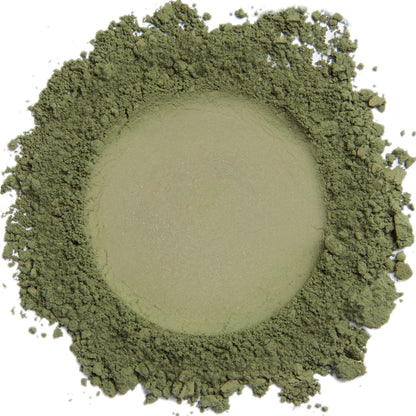 A close up swatch of Green Khaki mineral eye shadow.