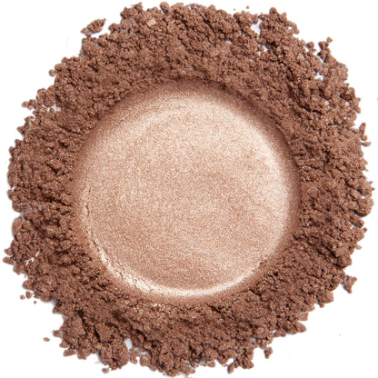 A close up swatch of Pink Copper mineral eye shadow.