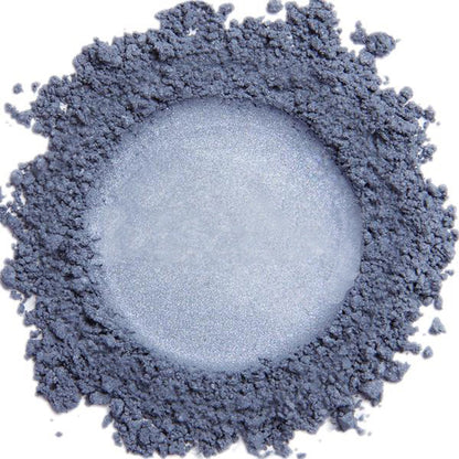 A close up swatch of Smoky Blue mineral eye shadow.