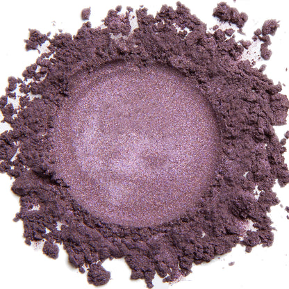 A close up swatch of Violet mineral eye shadow.