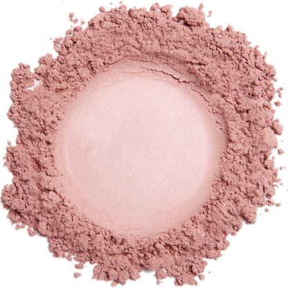 A close up swatch of Hint of Pink mineral blush