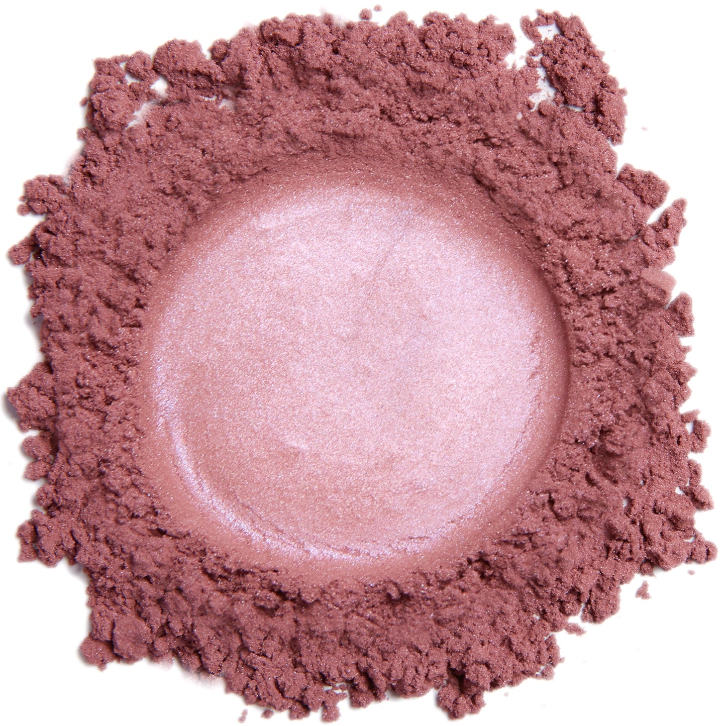 A close up swatch of Demure Pink Fusion mineral blush