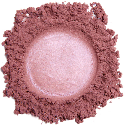 A close up swatch of Demure Pink Fusion mineral blush